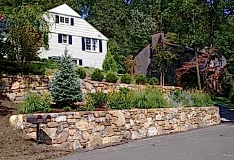 Stacked Stone Wall and Gardens create an inviting landscape at this Mountainside NJ property