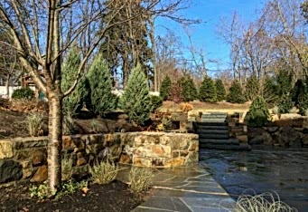 Patio and Gas Fire pit complete this landscaping design in Basking Ridge NJ