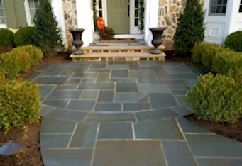 Bluestone Entry with plantings to line the way complete this front landscape design
