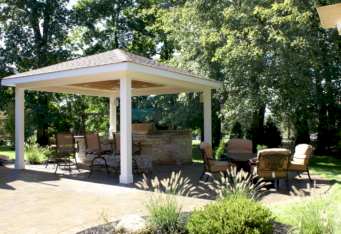 Outdoor seating and grilling area complete a Landscape Construction in Basking Ridge NJ
