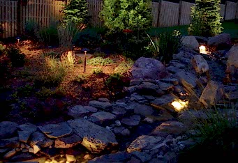 Landscape Lighting enhances the landscape design of this Summit NJ backyard